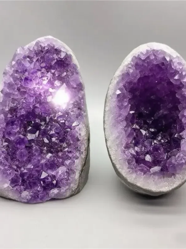 A stunning ethically sourced large Amethyst Geode with vibrant purple crystals. Ideal for home decor as a centerpiece, meditation spaces for spiritual healing, and crystal collections, this geode radiates positive energy and natural beauty.