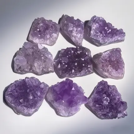 A close-up of ethically sourced Natural Amethyst Crystal Clusters showcasing rich purple shades and unique crystal formations. Ideal for energy healing, meditation, and as a captivating decor piece for home and office.