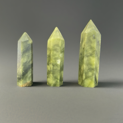 natural green fluorite obelisk tower with unique green hues and a sleek, pointed - top shape, great for decor and healing