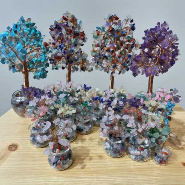 Rose quartz crystal tree with colorful gemstones in glass vase—healing home decor