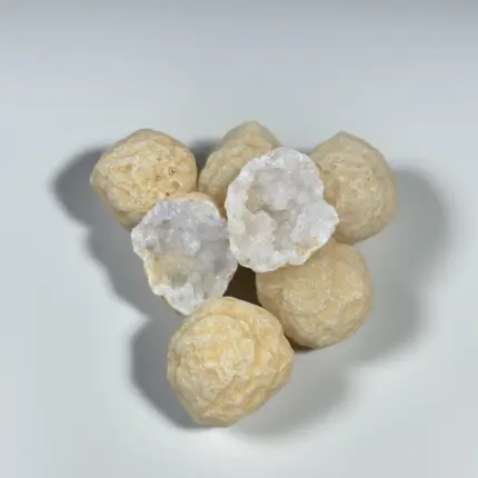 Unopened Mystical Morocco Crystal Cave Raw Stone Blind Box, wrapped in rustic burlap with hand - twisted hemp rope and a label featuring traditional Moroccan patterns and Arabic script