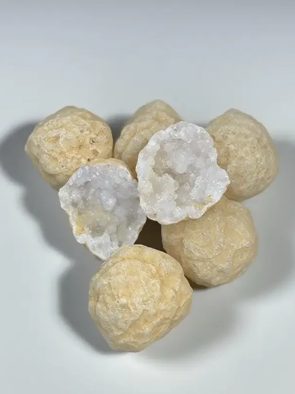 Unopened Mystical Morocco Crystal Cave Raw Stone Blind Box, wrapped in rustic burlap with hand - twisted hemp rope and a label featuring traditional Moroccan patterns and Arabic script